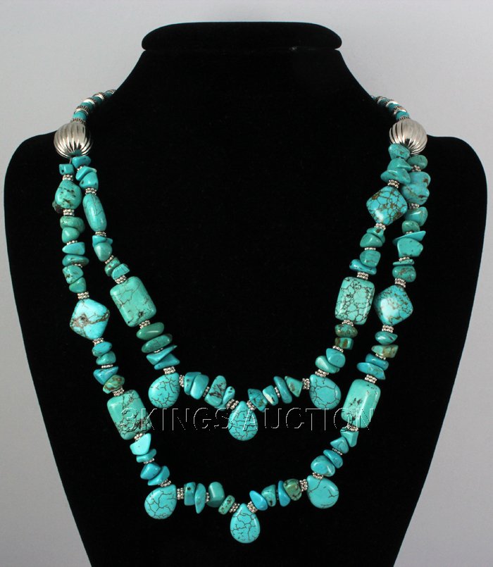 Natural 605.00ctw Turquoise Sterling Silver Necklace: Natural 605.00ctw Turquoise Sterling Silver Necklace **|**|** 22" Elegant Southwestern Style Turquoise Necklace with 2 Rows Design, 2 Silver Balls and Silver Bead Spacers and lobster lock. ; MSRP: $30