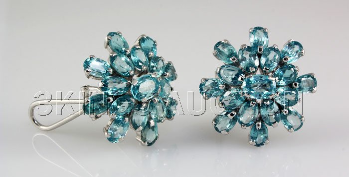 60.05CTW Flower Blue Zircon Cluster Silver Earring: 60.05CTW Flower Blue Zircon Cluster Silver Earring **|**|** Sky Blue Zircon Gemstone in Flower Design Silver Earring w/ Clipon Back; small 6x4mm*center 7x5mm; ctw: 26.90; stone count: 34; gram weight: