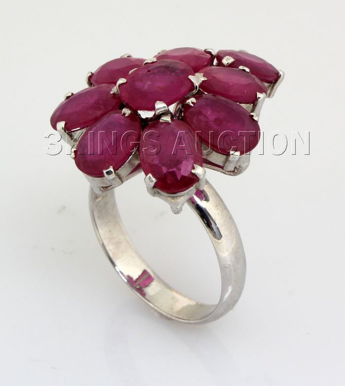 Beautiful 34.13CTW Flower Pink Ruby Silver Ring: Beautiful 34.13CTW Flower Pink Ruby Silver Ring **|**|** Sightly Flower Design Pink Ruby Sterling Silver Ring; Size: 8x6mm; ctw: 13.95; stone count: 9; gram weight: 4.04; ring size: 8.5 ; MSRP: $1500