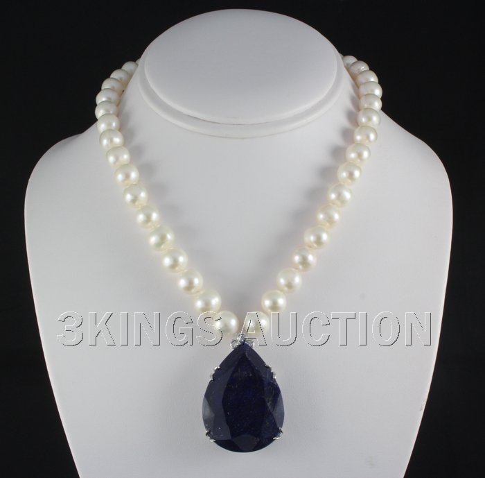 Elegant 426.31CTW FWP w/ SapphireCorrudumNecklace: Elegant 426.31CTW FWP w/ SapphireCorrudumNecklace **|**|** 10mm Fresh Water Pearl Necklace with Beautiful Sapphire Corrundum 14k White Gold Pendant; Ctw: 97.15; dia weight: 0.48; sapphire size: 41x31m