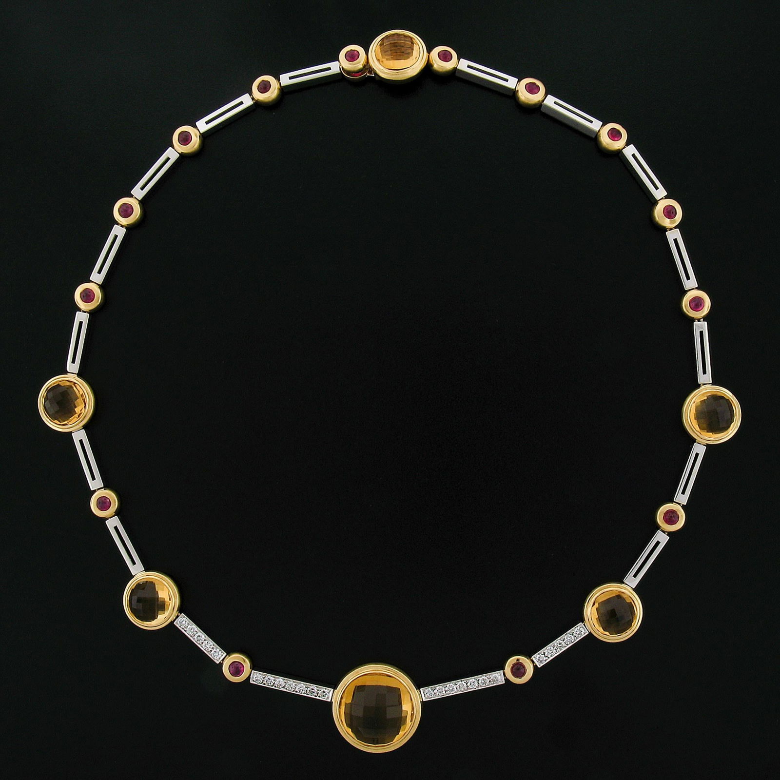 Antonini 18K TT Gold Round Bezel Citrine Diamond Ruby 16.5" Fancy Link Necklace: Antonini 18K TT Gold Round Bezel Citrine Diamond Ruby 16.5" Fancy Link Necklace Metal: Gold, White Gold, Yellow Gold Stone: Citrine, Diamond, Ruby Stone Cut: Round Cut Weight: 49.36 g Dimensions: Leng