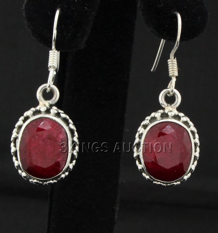 Sterling Silver 36.14ctw Oval Ruby Beryl Earring: Sterling Silver 36.14ctw Oval Ruby Beryl Earring **|**|** Petite Natural Ruby Gemstone in Sterling Silver Dangling Hook Earring size: 12.84x10.56mm; color: Red; Stone Family: Beryl ; MSRP: $400