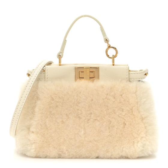 Fendi Shearling Shiny Nappa Micro: Fendi Shearling Shiny Nappa Micro Peekaboo Iconic Satchel White SKU no: RBJ1372289 Brand: FENDI Condition: Excellent Condition Details: Exterior: Edge wear, glue residue, surface wear, Hardware: Scrat