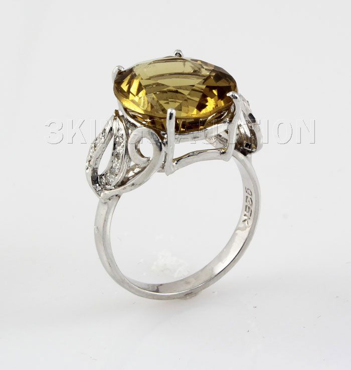 23.15CTW Big Stone Yellow Topaz Silver Ring: 23.15CTW Big Stone Yellow Topaz Silver Ring **|**|** 14x12mm Yellow Topaz with CZ Diamond Fashion Silver Ring; ring size 7.0 ; MSRP: $1000