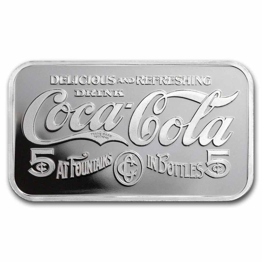 Coca-Cola Vintage 1 oz Silver: Coca-Cola Vintage 1 oz Silver Struck Bar SKU no: RBJ287483 Grade: None Grade Service: None Mint Mark: N/A - Not Available Metal Content: 1 troy oz Purity: .999 Thickness: 2.8 mm