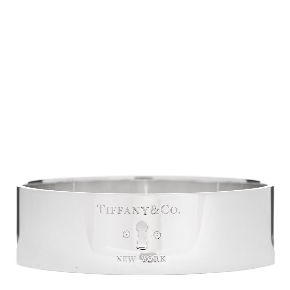 Tiffany Sterling Silver Diamond Wide: Tiffany Sterling Silver Diamond Wide Locks Bangle Bracelet Item #: 1400659 Brand: TIFFANY Condition: Very Good Condition Details: Hardware: Scratch(es) Circumference: 7.75 in Width: 20 mm