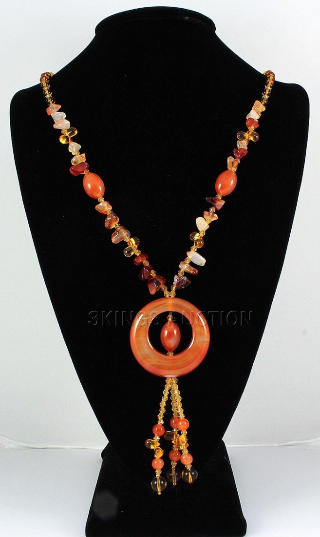 457.85CTW CHUNKY CARNELIAN RED ORANGE STONE NECKLACE: 457.85CTW CHUNKY CARNELIAN RED ORANGE STONE NECKLACE **|**|** COLORFUL CHUNKY 30" NECKLACE IS MADE UP OF CHIPS & BEADS IN VARIOUS SHADES OF CARNELIAN; SIZE: 51.47MM ; MSRP: $300