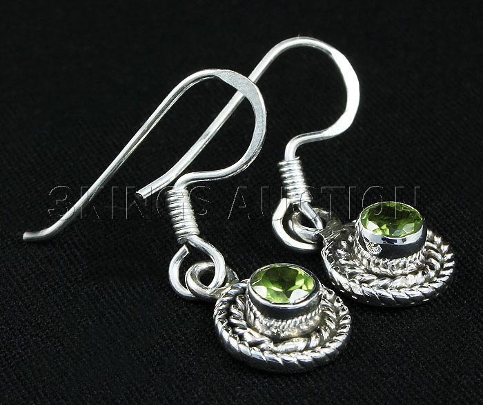 0.60CT Peridot Antique Design .925 HookEarring 2.24g: 0.60CT Peridot Antique Design .925 HookEarring 2.24g **|**|** 1.00in. Long Sterling Silver Dangling Hook Earring with a Peridot Faceted Gem Measuring 4mm Round ; MSRP: $300
