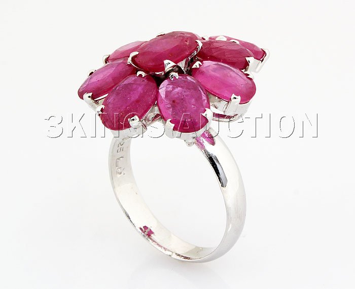 33.82CTW Natural Pink Ruby-Sterling Silver Ring: 33.82CTW Natural Pink Ruby-Sterling Silver Ring **|**|** Oval Shape Pinkish Ruby in Flower Design Silver Ring; Size: 8x6mm; ctw: 13.95; stone count: 9; gram weight: 3.97 ; MSRP: $1500