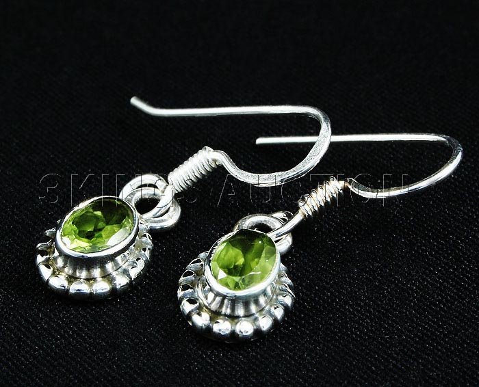 1.10CT Peridot Antique Design .925 HookEarring 2.03g: 1.10CT Peridot Antique Design .925 HookEarring 2.03g **|**|** 1.04in. Long Sterling Silver Dangling Hook Earring with a Peridot Faceted Gem Measuring 6x4mm Oval ; MSRP: $300