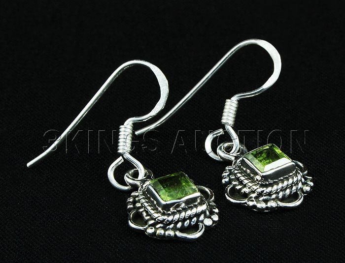 0.80CT Peridot Antique Design .925 HookEarring 2.85g: 0.80CT Peridot Antique Design .925 HookEarring 2.85g **|**|** 1.09in. Long Sterling Silver Dangling Hook Earring with a Peridot Faceted Gem Measuring 4x4mm Square ; MSRP: $300