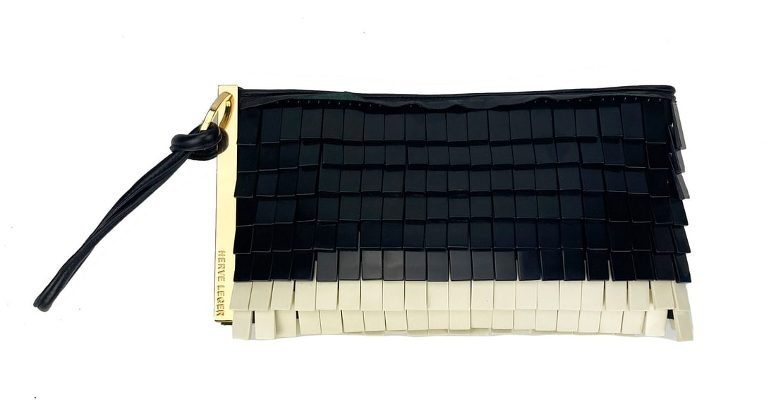 Herve Leger Black and White: Herve Leger Black and White Acrylic Chip Fringe Clutch Herve Leger Black and White Acrylic Chip Fringe Clutch in excellent condition. Unique Black and white acrylic small rectangle beads throughout ex