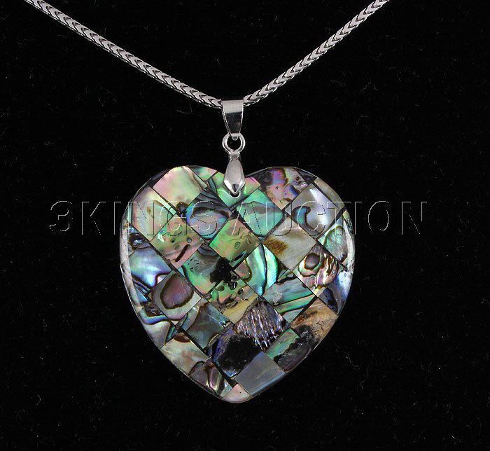 Natural 52.00ctw Mother Of Pearl Silver Pendant: Natural 52.00ctw Mother Of Pearl Silver Pendant **|**|** 37.81x36.76mm Like Glass Fill Moonstone Rainbow Color Mother of Pearl Sterling Silver Pendant ; MSRP: $300