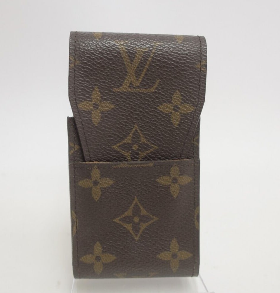 LOUIS VUITTON Etui Cigarette Case Monogram: LOUIS VUITTON Etui Cigarette Case Monogram Accessory #31538 Condition: Pre-Owned Condition: Used: An item that has been Pre-Owned previously. See the sellers listing for full details and ... Read more