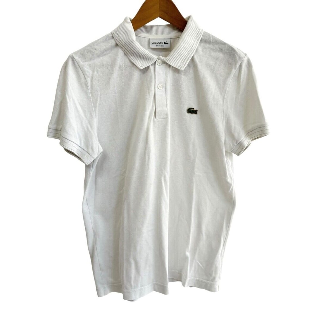 Auth Lacoste - White Gold Mens: Auth Lacoste - White Gold Mens Polo Shirt Condition: Pre-owned Brand: Lacoste Style: Polo Shirt Color: White, Gold Material: Please see the photo of the quality tag ConditionRank: 6 Depar