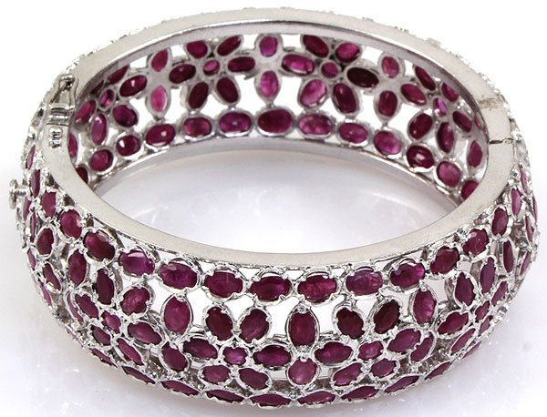 Ruby Bangle Bracelet 92.5 Sterling Silver 54 Grams Diam: Ruby Bangle Bracelet 92.5 Sterling Silver 54 Grams Diam: 2 1/4in. **|**|** Ruby Bangle Bracelet 92.5 Sterling Silver 54 Grams ; MSRP: $1000