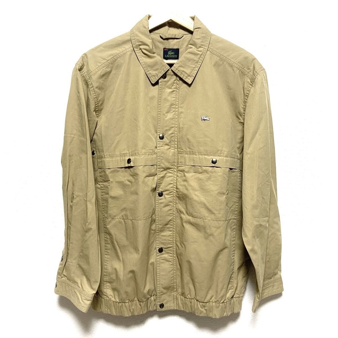Auth Lacoste - Beige Lightweight Jacket: Auth Lacoste - Beige Lightweight Jacket Condition: Pre-owned Brand: Lacoste Style: Lightweight Jacket Color: Beige Outer Shell Material: Please see the photo of the quality tag ConditionRank: 6 <b