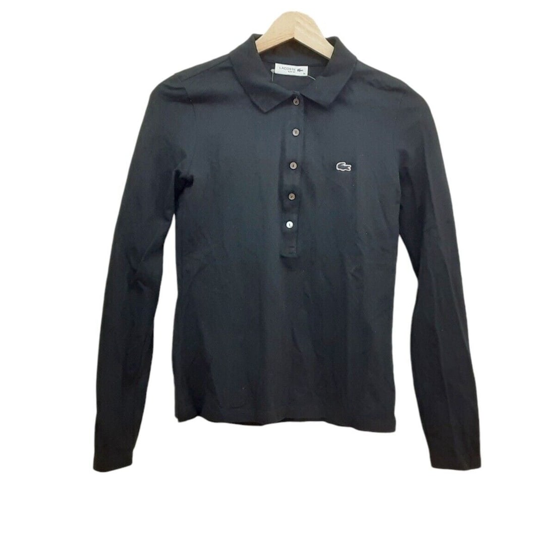 Auth Lacoste - Black Polo Shirt: Auth Lacoste - Black Polo Shirt Condition: Pre-owned Brand: Lacoste Style: Polo Shirt Color: Black Material: Please see the photo of the quality tag ConditionRank: 7 Department: Womens <b