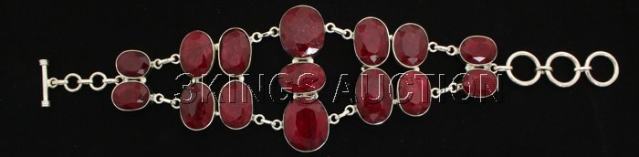 Fashion Silver 279.00ctw Oval Ruby Beryl Bracelet: Fashion Silver 279.00ctw Oval Ruby Beryl Bracelet **|**|** Heavy Cut Handmade Silver Bracelet with Natural Oval Ruby Gemstone size: 8.0 inches; color: Red; Stone Family: Beryl ; MSRP: $3100
