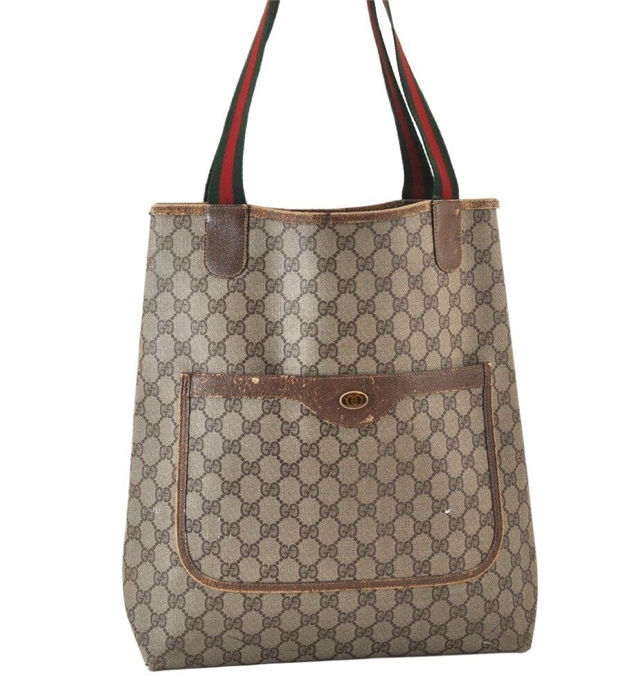 Authentic GUCCI Web Sherry Line Tote: Authentic GUCCI Web Sherry Line Tote Bag GG PVC Leather Brown Junk 7935L Condition: Pre-owned Brand: GUCCI Style: Tote bag Size: See description Bag Height: 13.8inches (35cm) Bag Depth: 3.5inches