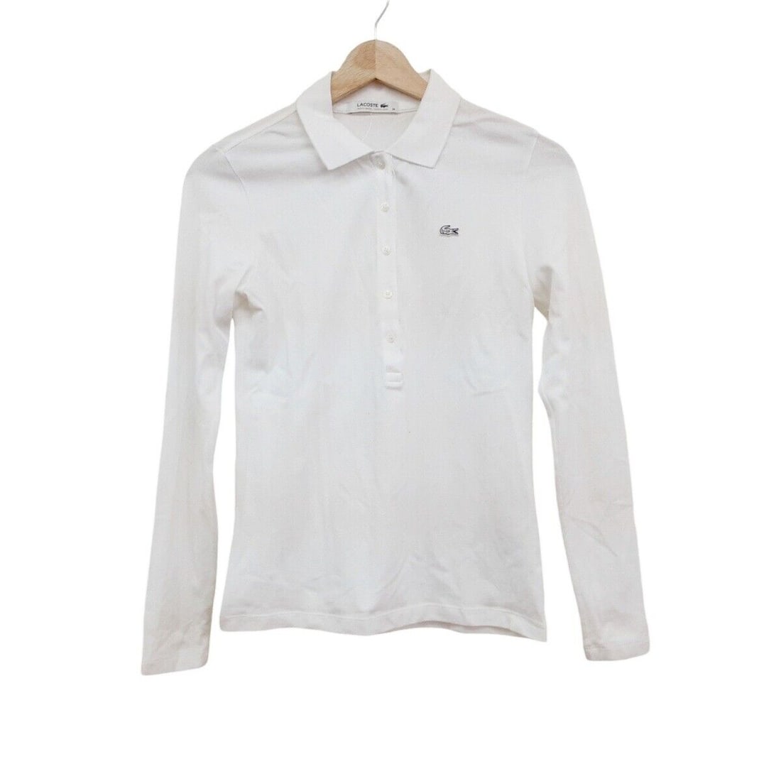 Auth Lacoste - White Womens Polo: Auth Lacoste - White Womens Polo Shirt Condition: Pre-owned Brand: Lacoste Style: Polo Shirt Color: White Material: Please see the photo of the quality tag ConditionRank: 7 Department: Wo