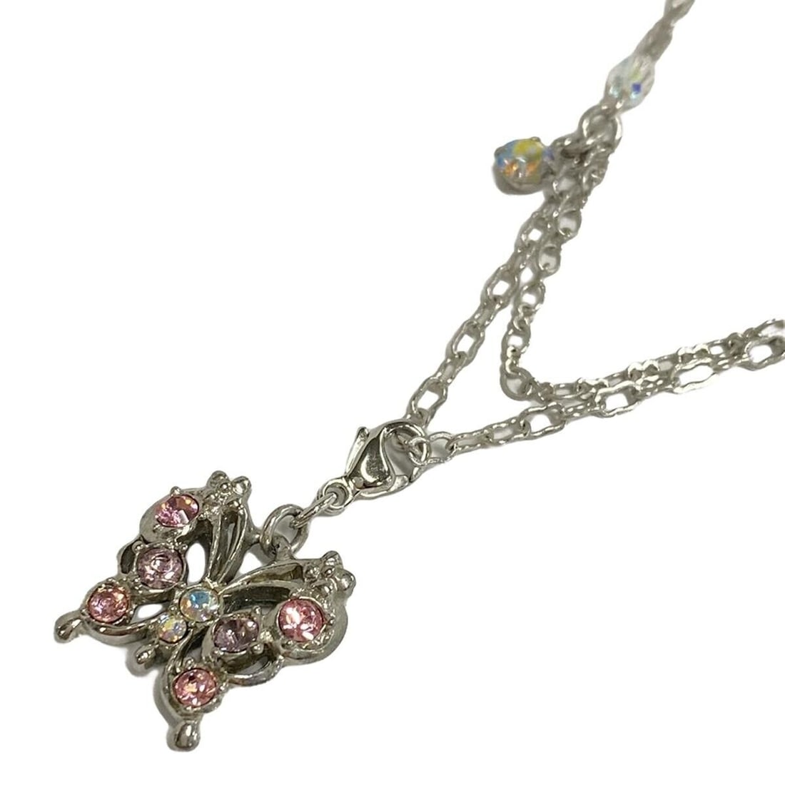 Auth ANNA SUI - Silver Pink: Auth ANNA SUI - Silver Pink Multi Hardware Rhinestones Color Stone Plastic Condition: Pre-owned Brand: ANNA SUI Style: Necklace Color: Silver, Pink, Multi Material: Hardware, Rhinestones, Color Stone,