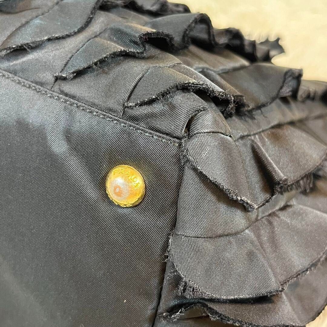 Prada tote bag chain ruffle black: Prada tote bag chain ruffle black handbag leather 11x15.3x4.7 inch Condition: Pre-owned Brand: PRADA Frame Ring Exterior Color: Black Style: Tote Guidelines for Bidding We reco