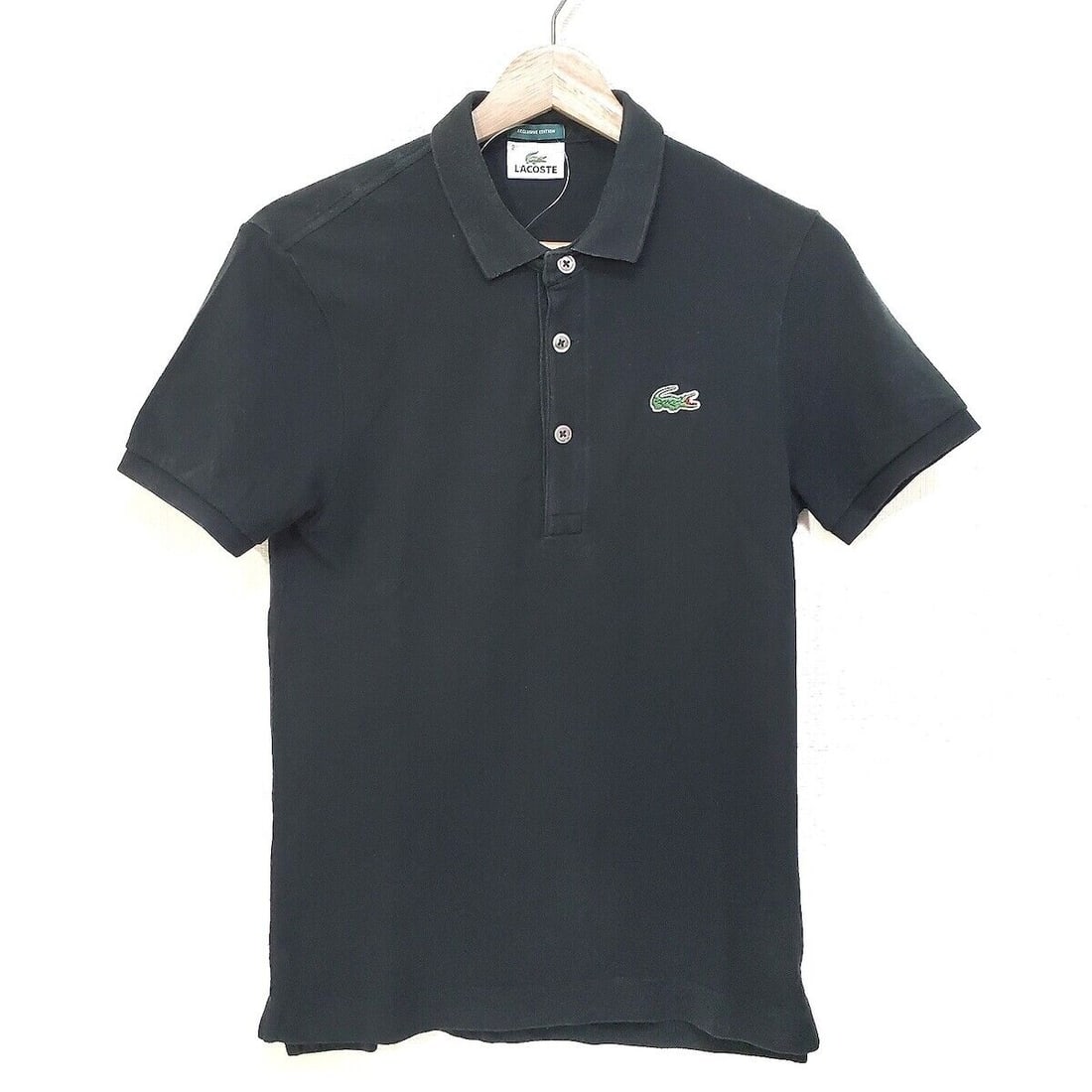 Auth Lacoste - Black Polo: Auth Lacoste - Black Polo Shirt Condition: Pre-owned Brand: Lacoste Style: Polo Shirt Color: Black Material: Please see the photo of the quality tag ConditionRank: 6 Department: <br