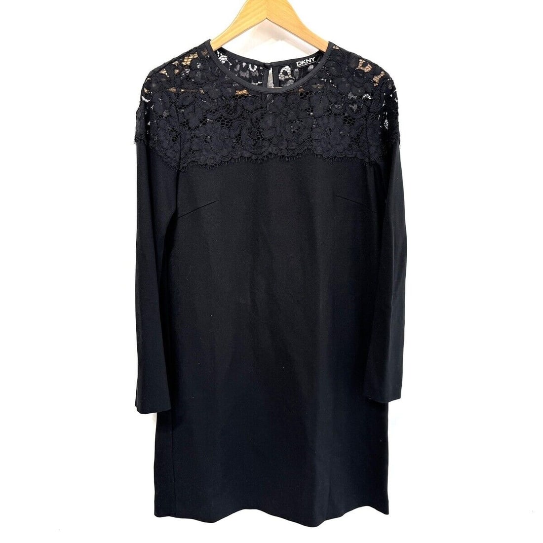 Auth DKNY - Black Dress: Auth DKNY - Black Dress Condition: Pre-owned Brand: DKNY Style: Dress Color: Black Material: Please see the photo of the quality tag ConditionRank: 7 Department: Type: Dress <b