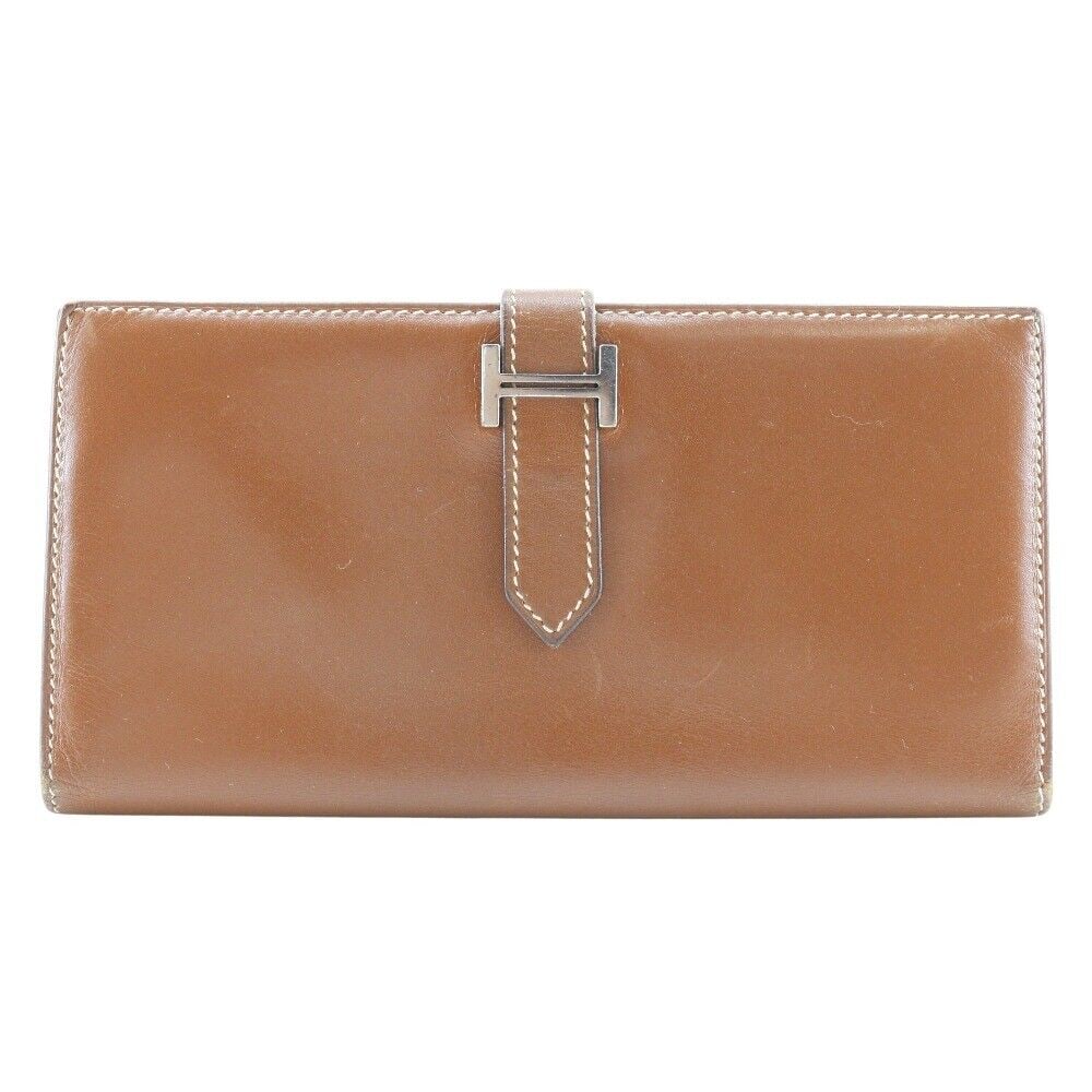 HERMES Bean Purse Brown Box carf: HERMES Bean Purse Brown Box carf unisex Condition: Pre-owned Brand: HERMES Style: Purse Material: Box carf Color: Brown Size: See Description Bag Height: 9cm Bag Length: 17.5cm <