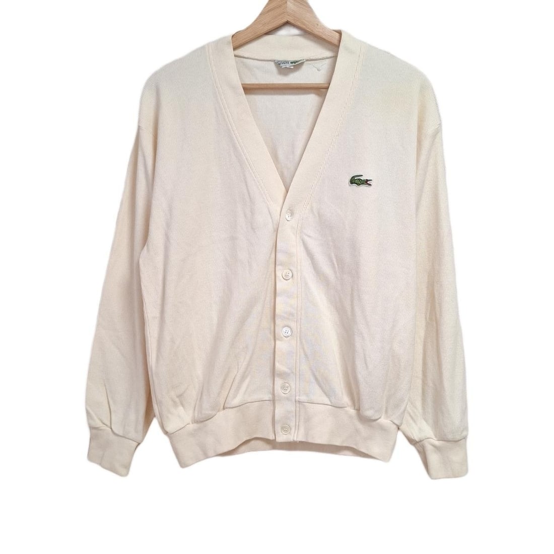 Auth Lacoste Cream Cardigan: Auth Lacoste Cream Cardigan Condition: Pre-owned - Good Brand: Lacoste Style: Cardigan Color: Cream Material: Please see the photo of the quality tag ConditionRank: 5 Department: <b