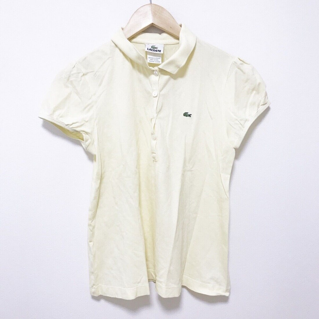 Auth Lacoste - Light Yellow: Auth Lacoste - Light Yellow Polo Shirt Condition: Pre-owned Brand: Lacoste Style: Polo Shirt Color: Light Yellow Material: Please see the photo of the quality tag ConditionRank: 6 Depart