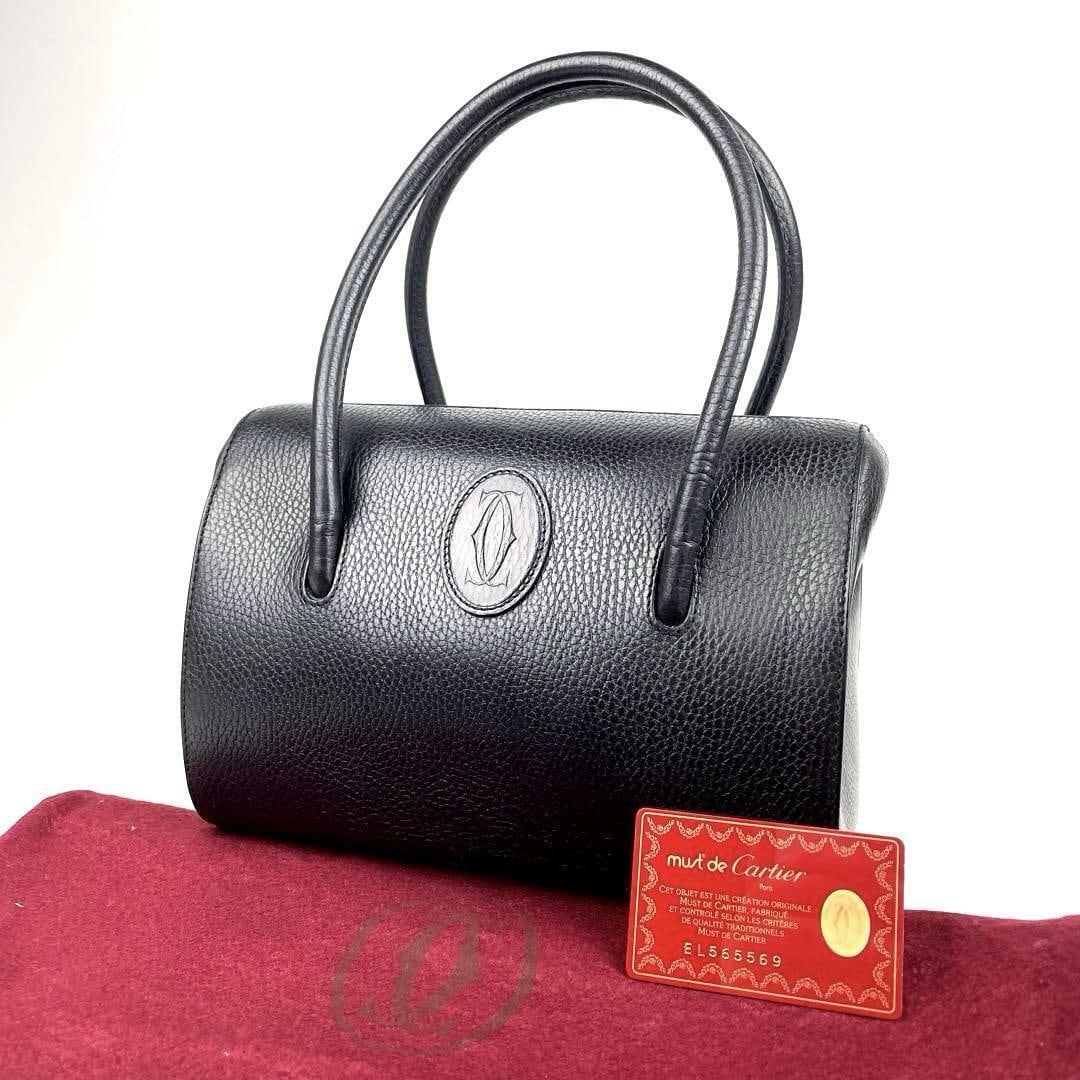 Cartier Handbag Mustline Gold Hardware Leather: Cartier Handbag Mustline Gold Hardware Leather Black 250219H Condition: Pre-owned Handle/Strap Color: Gold Hardware Color: Black Exterior Material: Leather Brand: Cartier Department: Ladies