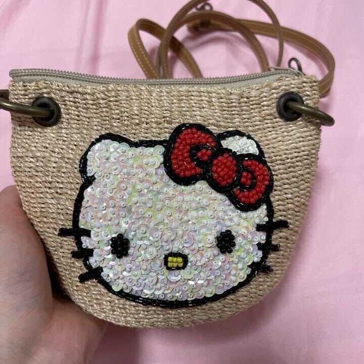 Hello Kitty Super rare Nina mew: Hello Kitty Super rare Nina mew Kitty collaboration Basket pochette Used Condition: Used Brand: Nina mew Language: Japanease Color: Multicolor MPN: NA Country/Region of Manufacture: Unknown <b