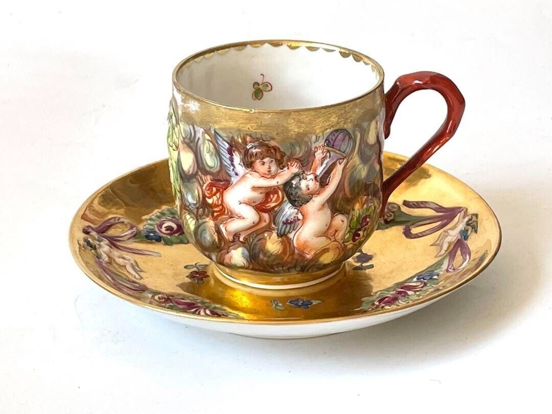 Antique Italy Capodimonte Cup Saucer Gold: Antique Italy Capodimonte Cup Saucer Gold Used Condition: Used Origin: NA Number of Items in Set: NA Shape: NA Signed By: NA Occasion: All Occasions Keeps Cold For: NA MPN: NA <b