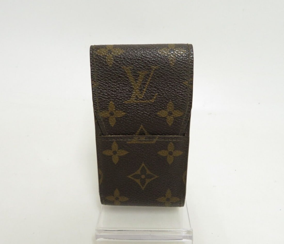 LOUIS VUITTON Etui Cigarette Case Monogram: LOUIS VUITTON Etui Cigarette Case Monogram Accessory #39867 Condition: Used Condition: Used: An item that has been used previously. See the sellers listing for full details and ... Read more about the