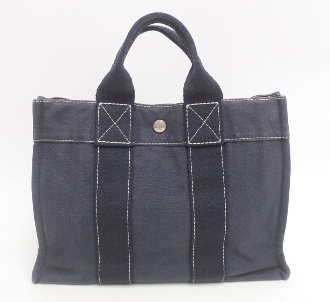 Authentic Hermes Fourre Tout PM Canvas: Authentic Hermes Fourre Tout PM Canvas Tote Bag #30476 Condition: Pre-owned Brand: HERMeS Department: Women Exterior Color: Navy Style: Tote Fabric Type: Canvas Country/Region of Manufact