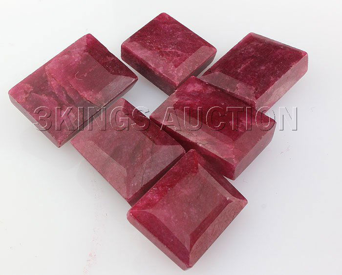Ruby 126.38 ctw Loose Gemstone Mix Sizes Emerald Cut: Ruby 126.38 ctw Loose Gemstone Mix Sizes Emerald Cut **|**|** Natural Ruby Loose Gemstone 15 - 21 MM in size Emerald Shape lot of 6 ; MSRP: $400