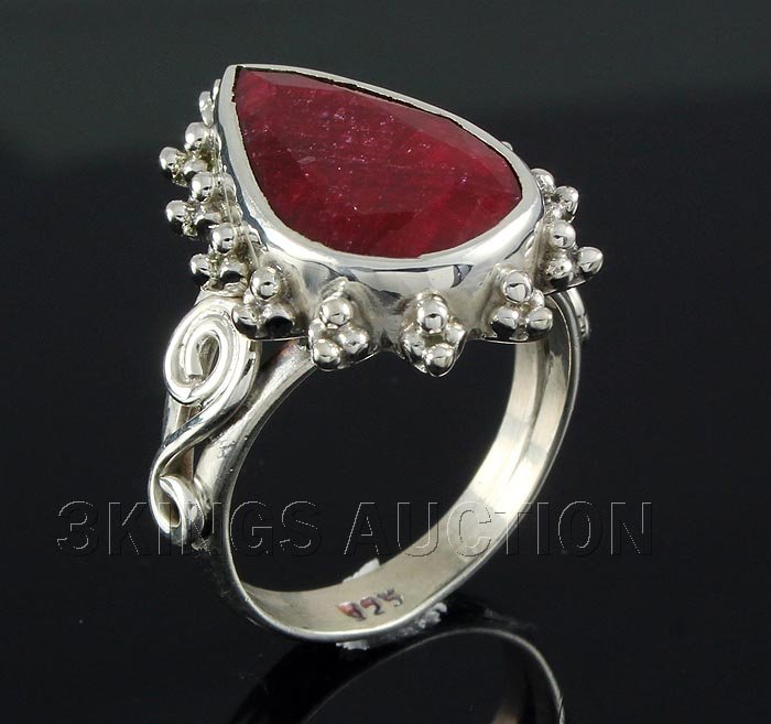 RUBY CORRUNDUM 27.63CTW STERLING SILVER RING: RUBY CORRUNDUM 27.63CTW STERLING SILVER RING **|**|** 17.38X10.95MM PEAR SHAPE RUBY CORRUNDUM FLOWER DESIGN SILVER RING; SIZE 6 ; MSRP: $300