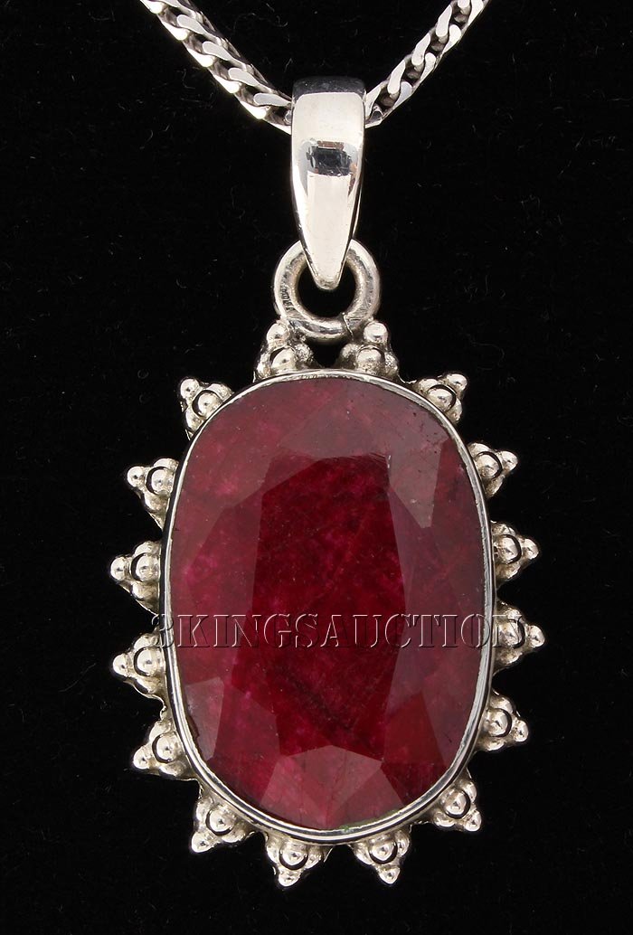 RUBY CORRUNDUM 36.13CTW STERLING SILVER PENDANT: RUBY CORRUNDUM 36.13CTW STERLING SILVER PENDANT **|**|** 21X15MM OVAL SHAPE RUBY CORRUNDUM FLOWER DESIGN SILVER PENDANT ; MSRP: $400