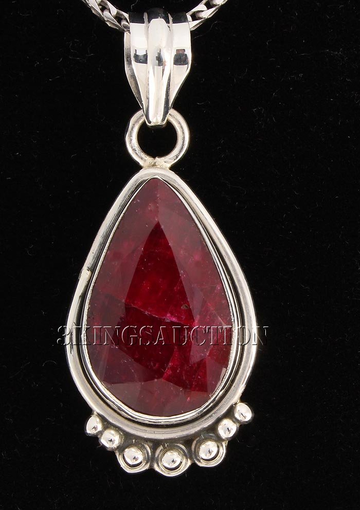 RUBY CORRUNDUM 30.52CTW STERLING SILVER PENDANT: RUBY CORRUNDUM 30.52CTW STERLING SILVER PENDANT **|**|** 20X13MM PEAR SHAPE RUBY CORRUNDUM BEZEL TYPE SILVER PENDANT ; MSRP: $300