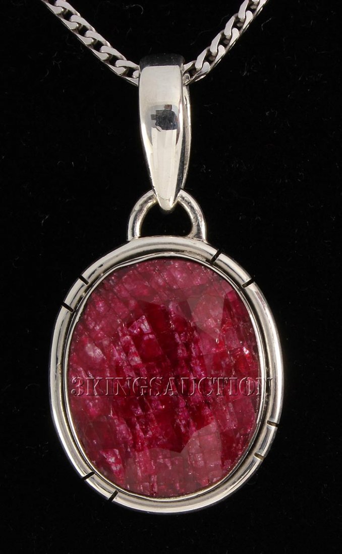 RUBY CORRUNDUM 29.11CTW STERLING SILVER PENDANT: RUBY CORRUNDUM 29.11CTW STERLING SILVER PENDANT **|**|** 18X15MM OVAL SHAPE RUBY CORRUNDUM BEZEL TYPE SILVER PENDANT ; MSRP: $300