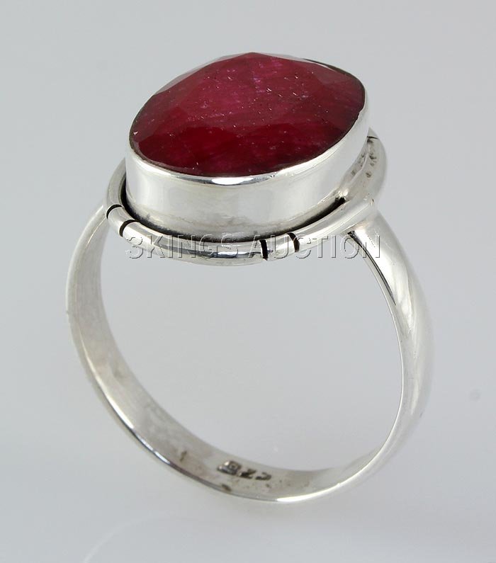 RUBY CORRUNDUM 21.93CTW STERLING SILVER RING: RUBY CORRUNDUM 21.93CTW STERLING SILVER RING **|**|** 15X12MM OVAL SHAPE RUBY CORRUNDUM BEZEL TYPE SILVER RING; SIZE 7 ; MSRP: $300