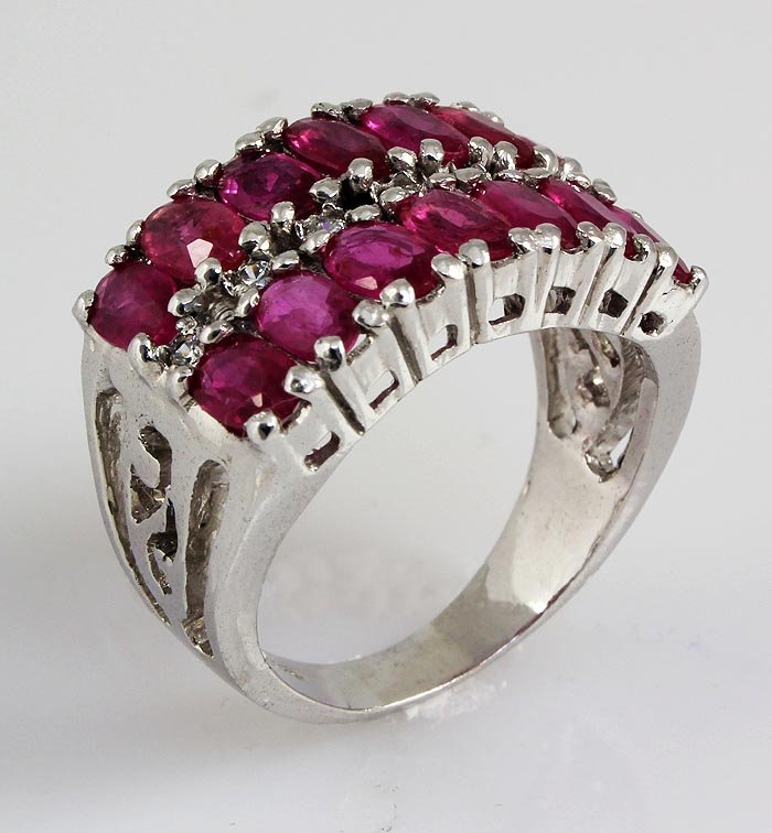 33.63CTW Fashion Pink Ruby Sterling Silver Ring: 33.63CTW Fashion Pink Ruby Sterling Silver Ring **|**|** Cluster of Oval Shape Ruby w/ CZ Diamond Silver Ring; Size: 5x3mm; ctw: 4.90; stone count: 14; gram weight: 5.75; ring size: 7 ; MSRP: $1500