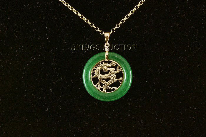 24.00ctw Good Fortune Dragon Jade Silver Pendant: 24.00ctw Good Fortune Dragon Jade Silver Pendant **|**|** Chinese Green Jade Pendant with Yellow Silver Dragon measuring 29.62x29.59mm ; MSRP: $300