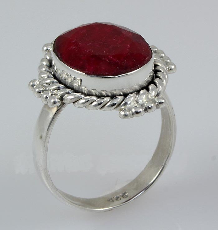 RUBY CORRUNDUM 26.33CTW STERLING SILVER RING: RUBY CORRUNDUM 26.33CTW STERLING SILVER RING **|**|** 14X12MM OVAL SHAPE RUBY CORRUNDUM ANTIQUE DESIGN SILVER RING; SIZE 6 ; MSRP: $300
