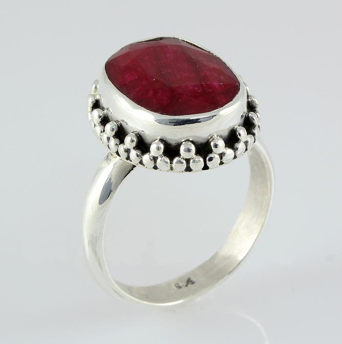 RUBY CORRUNDUM 27.44CTW STERLING SILVER RING: RUBY CORRUNDUM 27.44CTW STERLING SILVER RING **|**|** 14.88X11.63MM OVAL SHAPE RUBY CORRUNDUM FLOWR DESIGN SILVER RING; SIZE 6.5 ; MSRP: $300