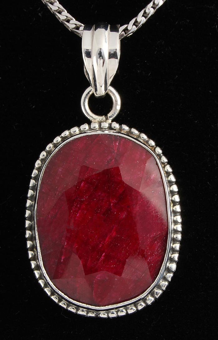 RUBY CORRUNDUM 38.36CTW STERLING SILVER PENDANT: RUBY CORRUNDUM 38.36CTW STERLING SILVER PENDANT **|**|** 23X18MM OVAL SHAPE RUBY CORRUNDUM STERLING SILVER PENDANT ; MSRP: $500