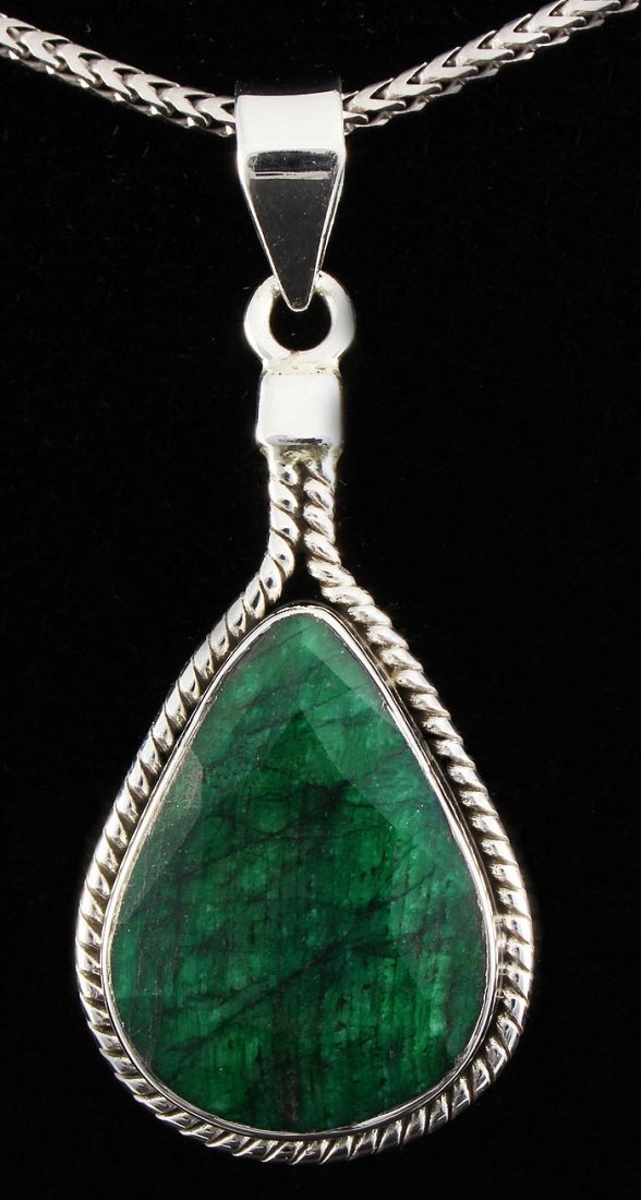 NATURAL EMERALD BERYL 34.25CTW SILVER PENDANT: NATURAL EMERALD BERYL 34.25CTW SILVER PENDANT **|**|** STERLING SILVER PEAR PENDANT WITH 22X16MM APPROX EMERALD BERYL GEMSTONE ; MSRP: $100