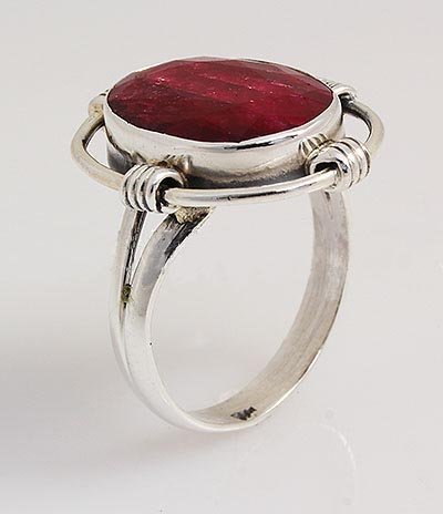 RUBY CORRUNDUM 33.00CTW UNIQUE DESIGN .925 RING: RUBY CORRUNDUM 33.00CTW UNIQUE DESIGN .925 RING **|**|** STERLING SILVER OVAL RING WITH 16X12MM APPROX RUBY CORRUNDUM GEMSTONE ; MSRP: $100